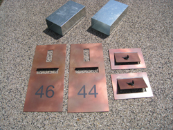 Copper painted faceplates and backplates with laseretched numbers. Galvanised steel sleeves